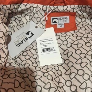 Never worn! Great riding vest!